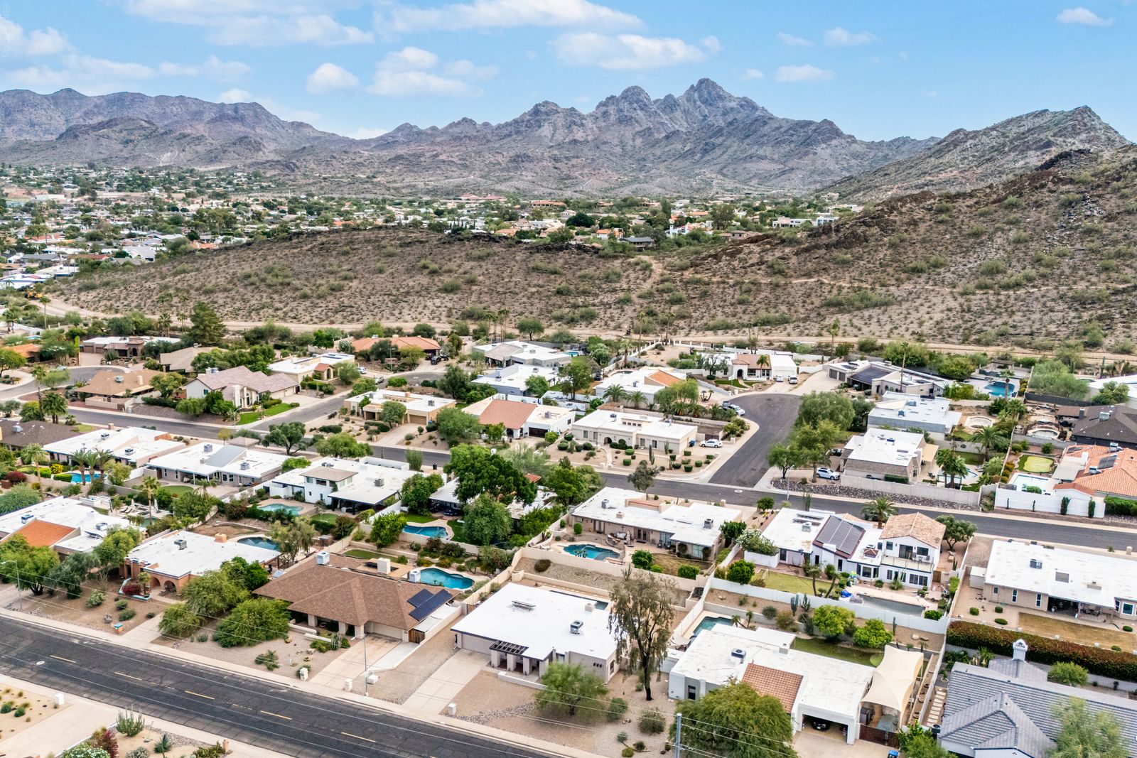 Aerial view of the neighborhood and mountain preserve