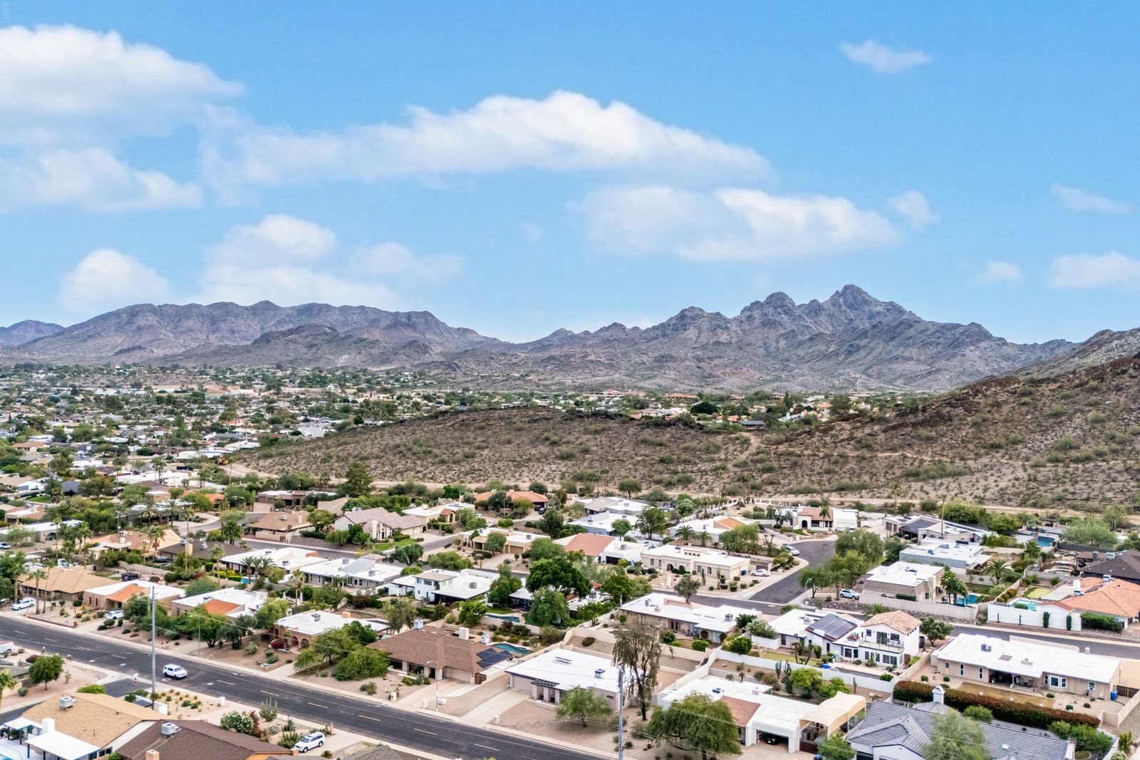 Aerial view of the neighborhood below the mountains